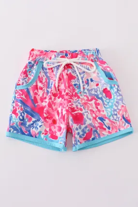 Tropical Sunset Waves swim trunks